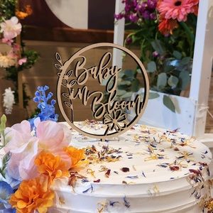 Baby in bloom cake topper